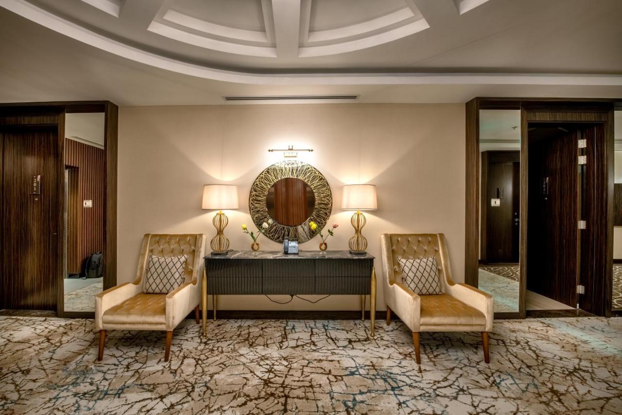 Nivel Hotel Abha Khamis Mushait Exterior photo The interior of a suite at the Ritz-Carlton, DIFC