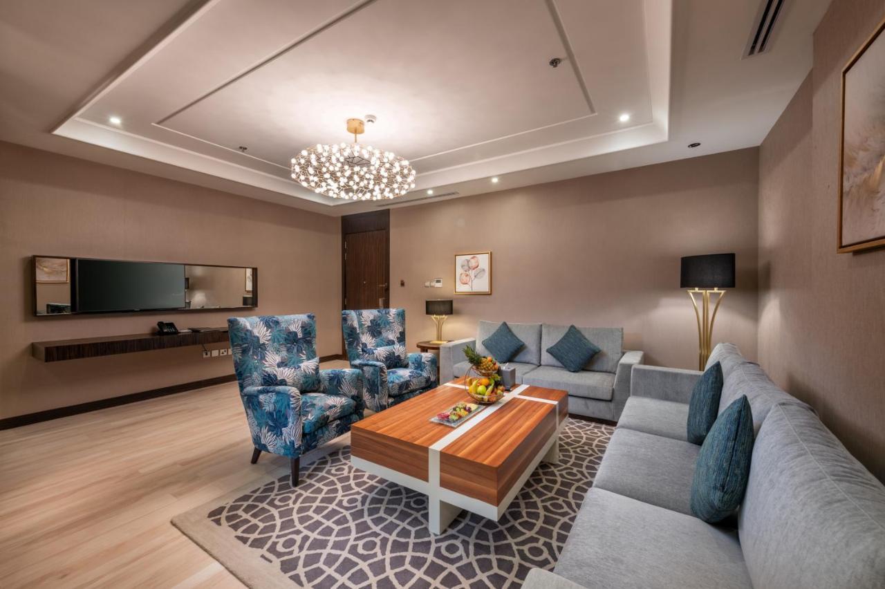 Nivel Hotel Abha Khamis Mushait Exterior photo A living room in a suite at the hotel
