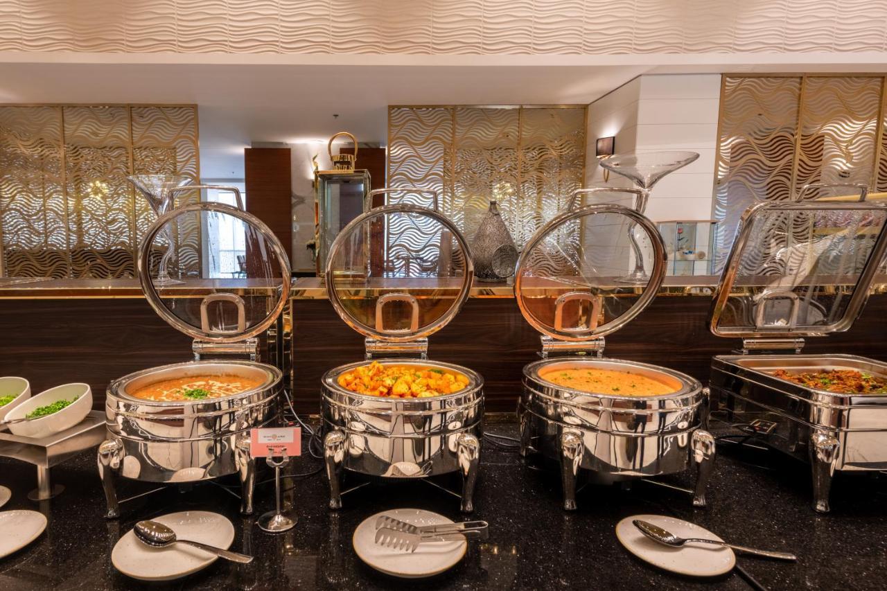Nivel Hotel Abha Khamis Mushait Exterior photo A chafing dish