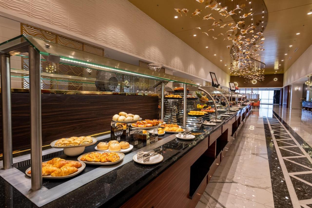Nivel Hotel Abha Khamis Mushait Exterior photo The buffet at the hotel