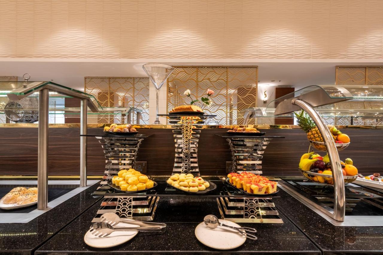 Nivel Hotel Abha Khamis Mushait Exterior photo A buffet at a hotel